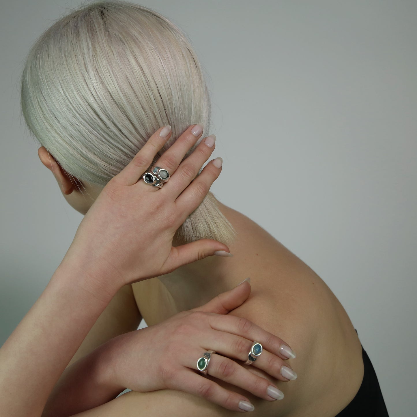 The Velvet ring is a handmade piece made of 925 sterling silver. Its surface is raw, and it features a semi-precious stone. It has a glossy finish.