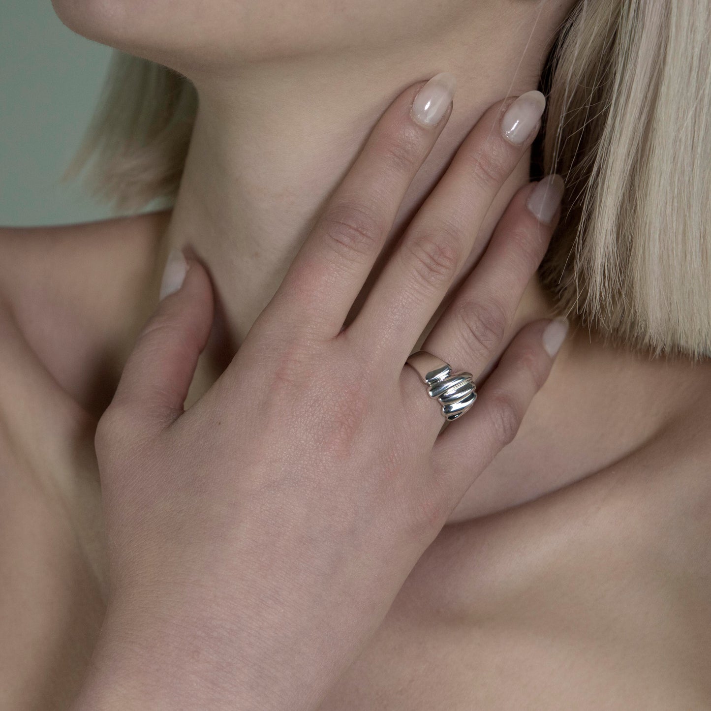 The Parv ring is a handmade piece made of 925 sterling silver. It consists of three vertical bands of silver with smooth and glossy finishes