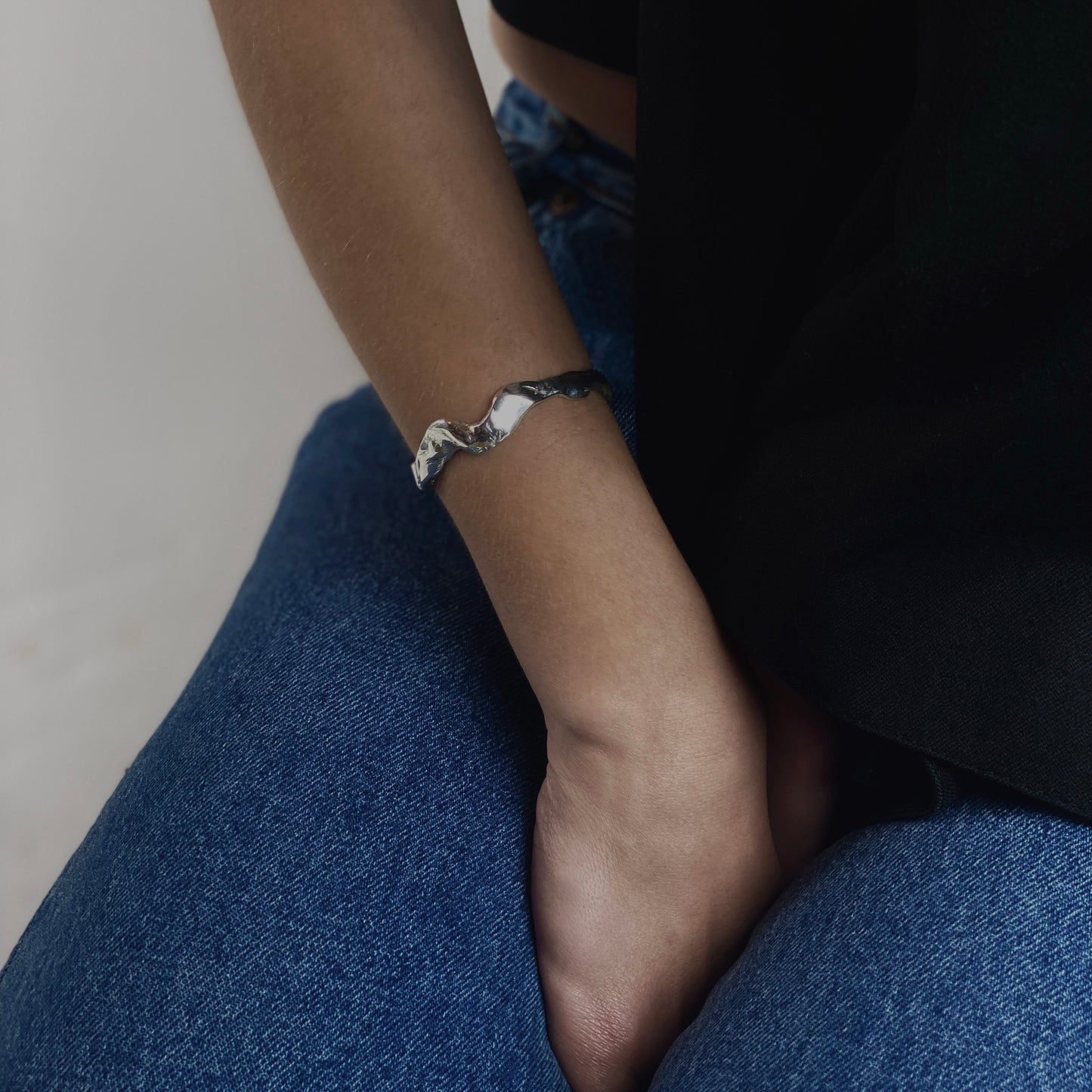 Handmade wavy bracelet with a raw form, crafted from sterling silver 925.