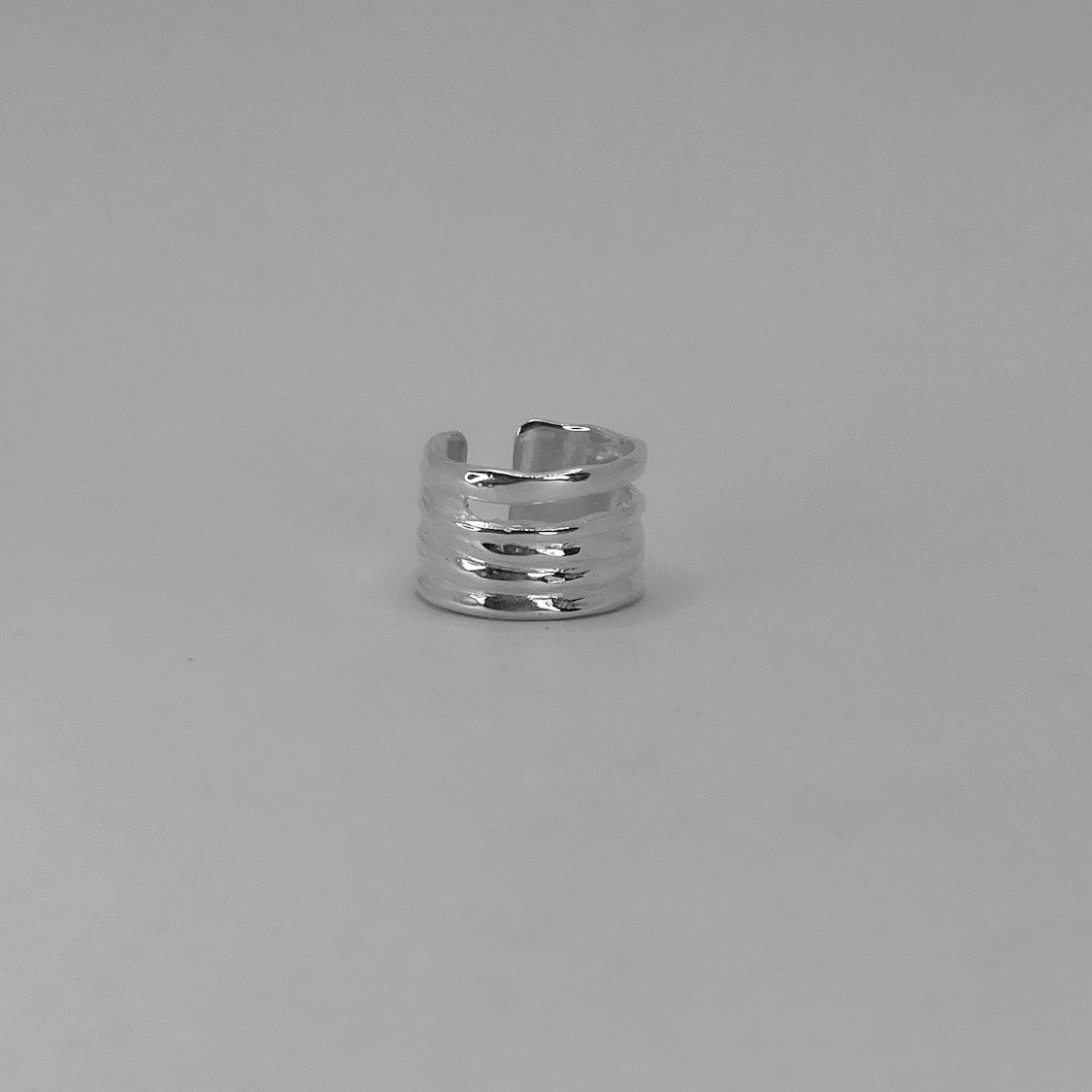 Handcrafted 925 Sterling Silver Ring
Material: 925 Sterling Silver
Size & Fit: Available in sizes 43mm to 58mm. Features an open, adjustable design that
can be resized up to 3 sizes for a custom, perfect fit.
Finish: Smooth, polished finish with an organic, raw aesthetic
Craftsmanship: 100% Handcrafted in Greece
Production: Made to order
Shipping: Ships within 5–10 business days
Each piece of jewelry is individually handcrafted and unique. Slight variations may occur, reflecting the artisanal pro