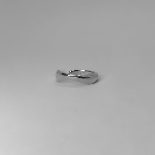 The Wavy ring is a handmade piece made of 925 sterling silver. It is a thin wavy band and it is smooth and glossy