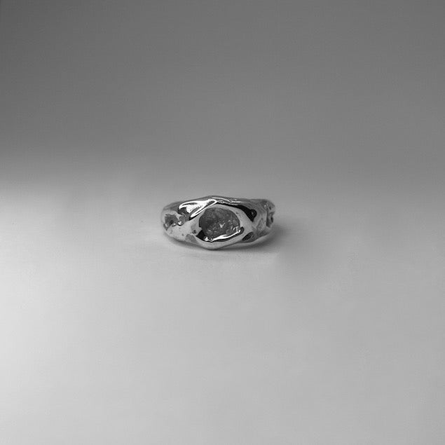 The Wild ring is a handmade piece made of 925 sterling silver. Its surface is raw and glossy