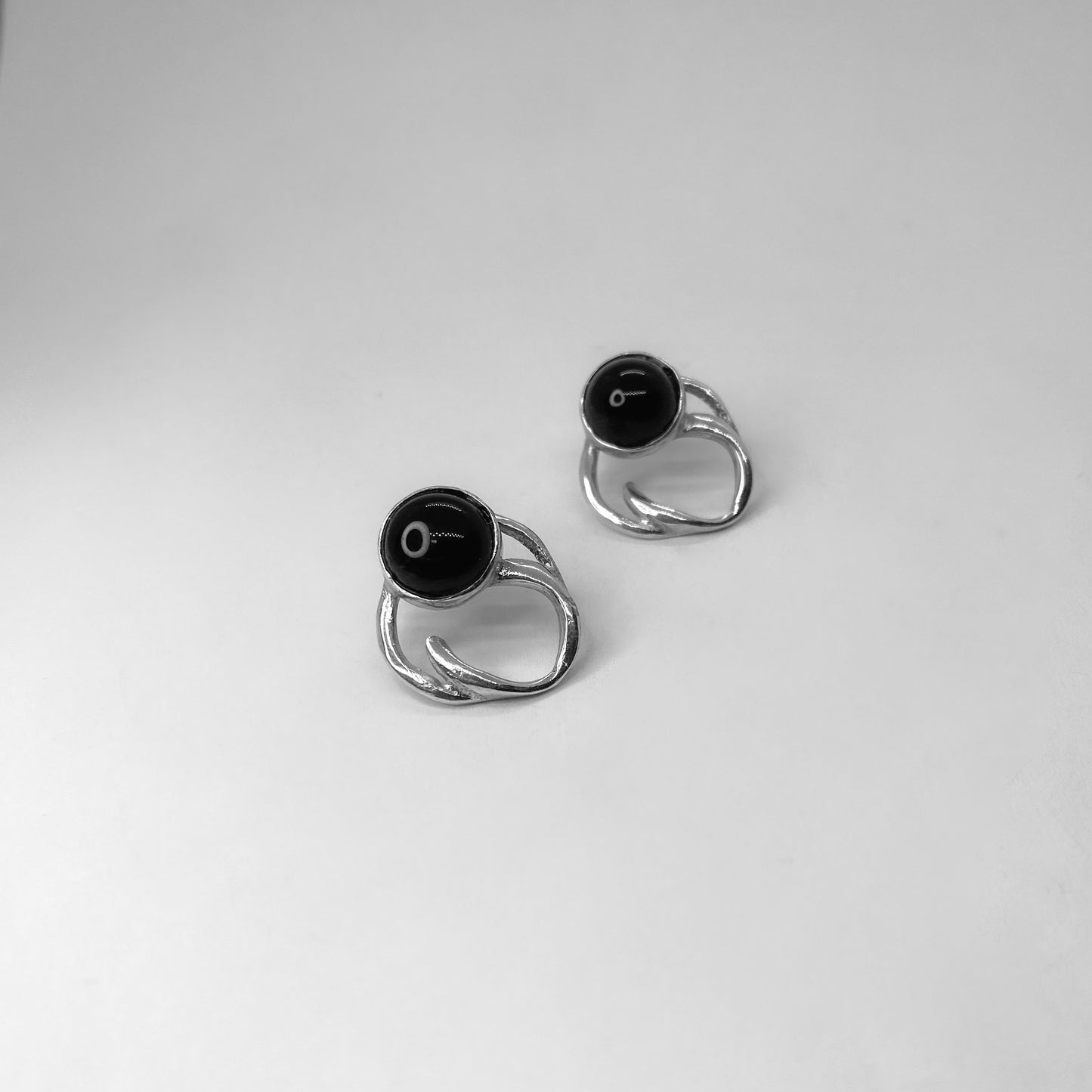 Handmade earrings crafted from sterling silver 925 with a semi-precious stone.