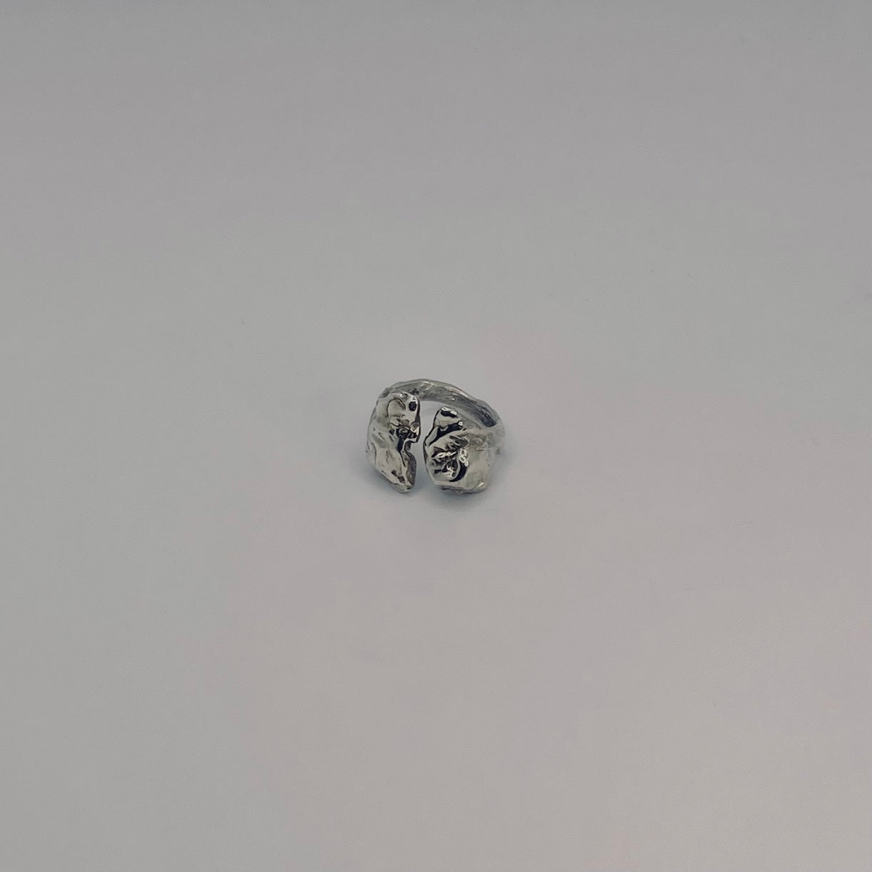 Handcrafted 925 Sterling Silver Ring

Material: 925 Sterling Silver
Size &amp; Fit: Available in sizes 47mm to 60mm. Features an open, adjustable design that can be resized up to 3 sizes for a custom, perfect fit.
Finish: Smooth, polished finish with an organic, raw aesthetic
Craftsmanship: 100% Handcrafted in Greece
Production: Made to order
Shipping: Ships within 5–10 business days
Each piece of jewelry is individually handcrafted and unique. Slight variations may occur, reflecting the artisanal process a